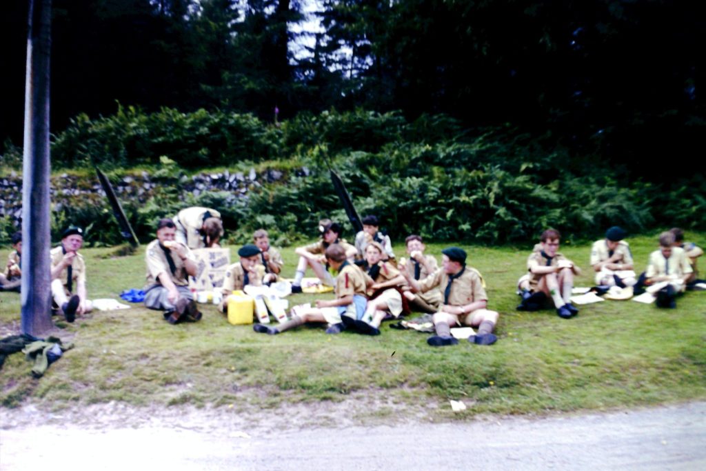 Scouts sitting down eating lunch - 1964